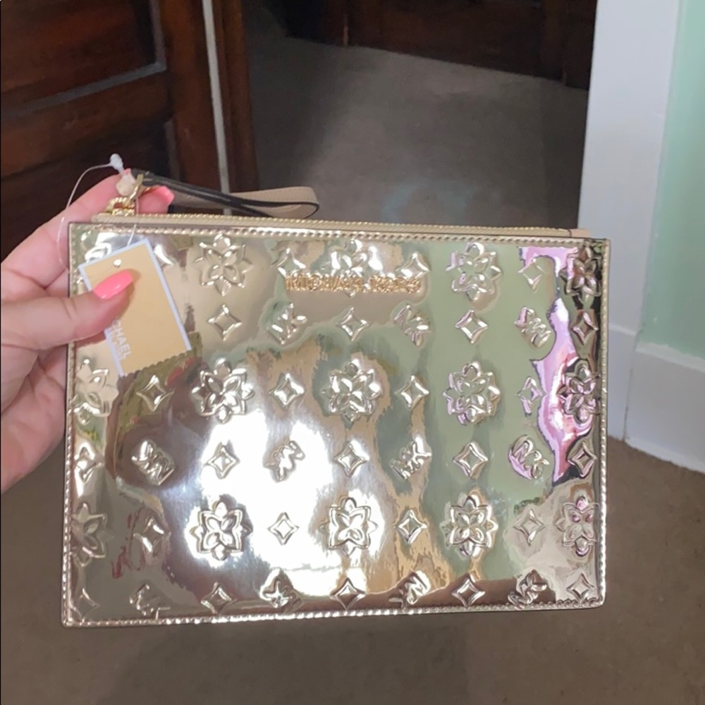 Michael Kors gold wristlet